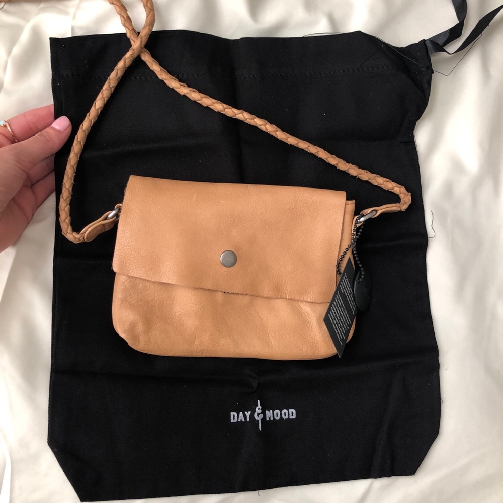 Tan Leather cross body purse. NWT